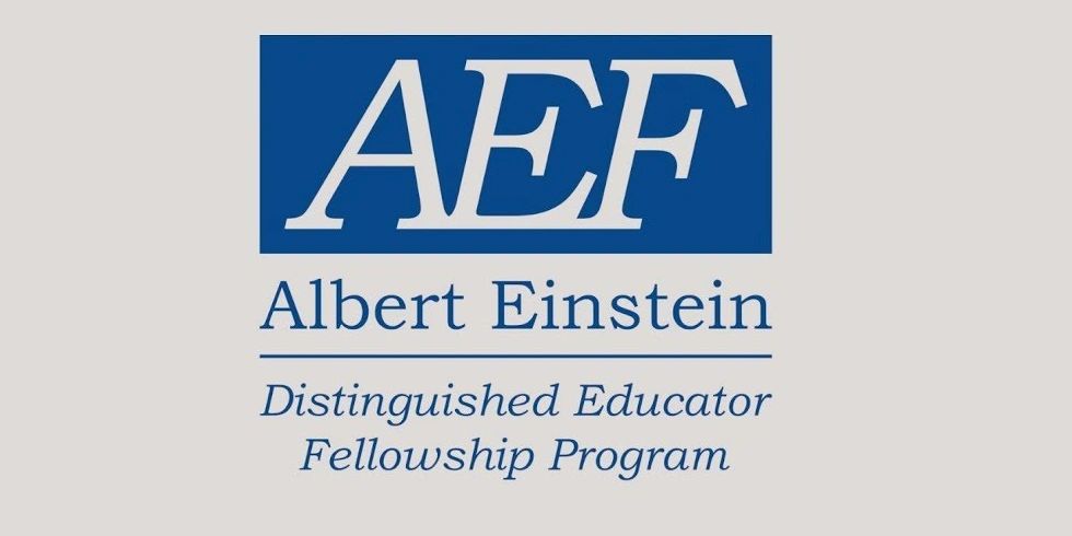 A blue and white logo for the albert einstein distinguished educator fellowship program.